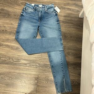 Brand new Good American jeans with tags. Limited style, slit bottom, high rise